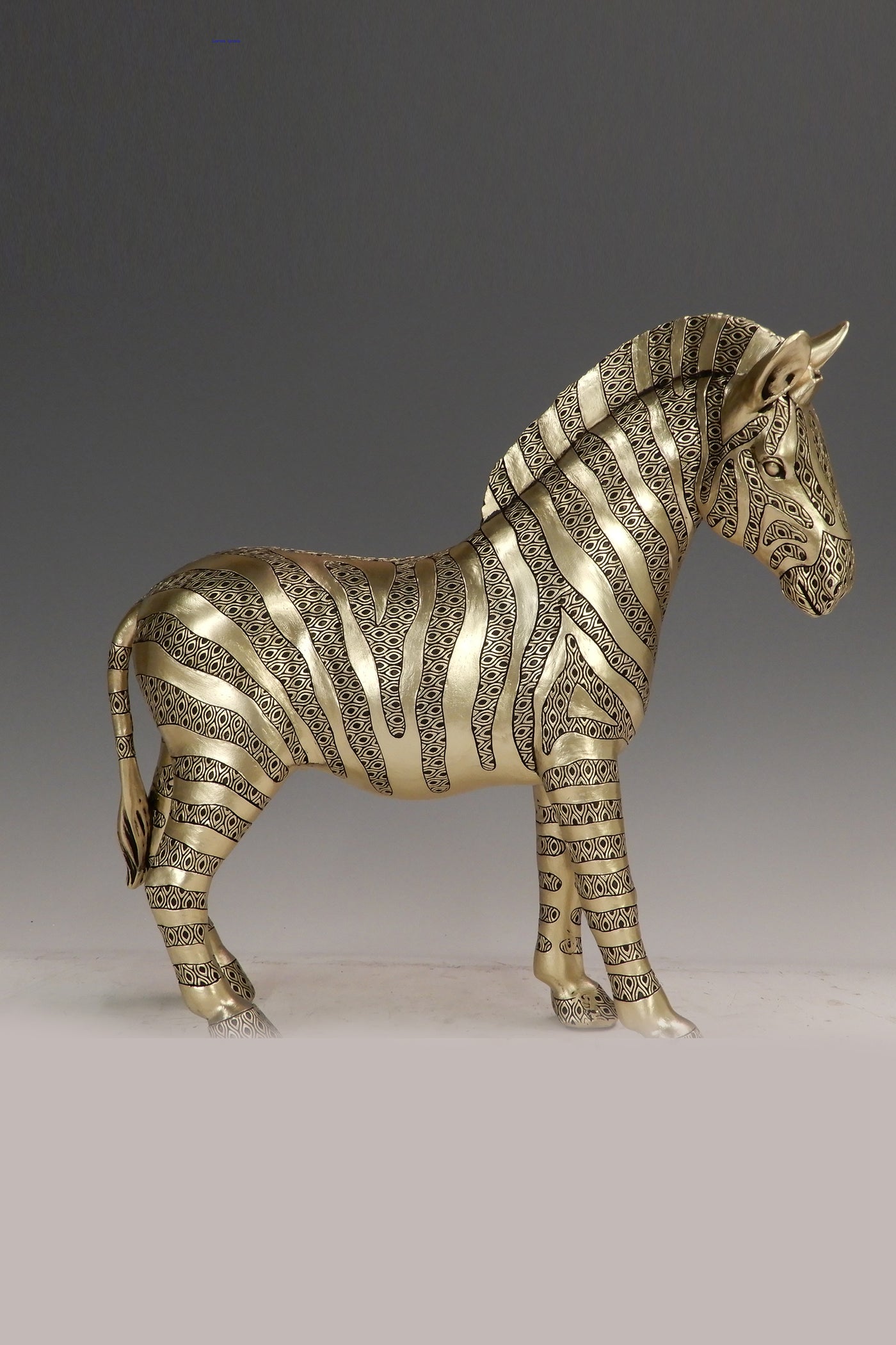 Golden resin zebra statue for your home or office decor