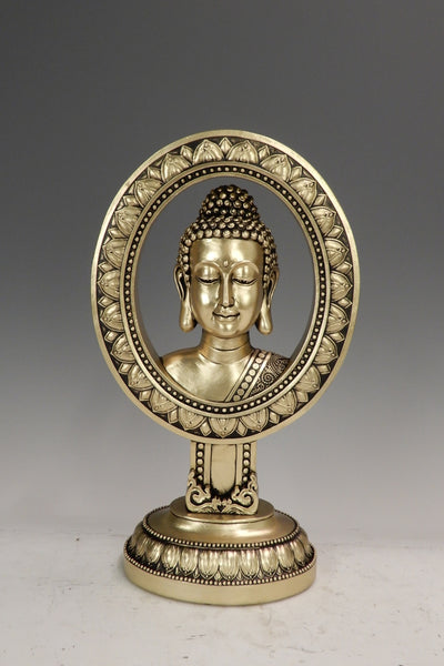 Gautama Buddha's face in an oval on the Golden base of a stand for your home or office decoration