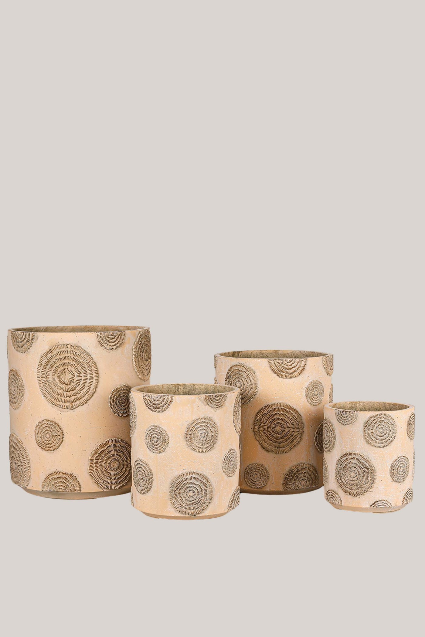 Beige Textured Resin Planter with Circular Patterns